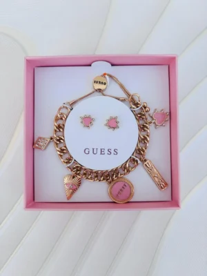 Pulsera Guess en Dorado chams rosas