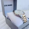 Reloj Steve Madden Pulsera Gris y Dorado