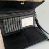 Cartera Steve Madden color Negro Trifold