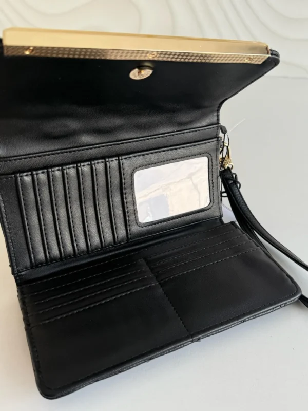 Cartera Steve Madden color Negro Trifold