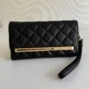 Cartera Steve Madden color Negro Trifold