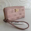 Cartera Steve Madden rosa gold cierre completo