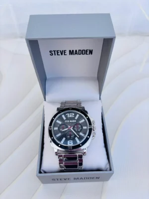 Reloj analogico marca steve madden pulsera gris
