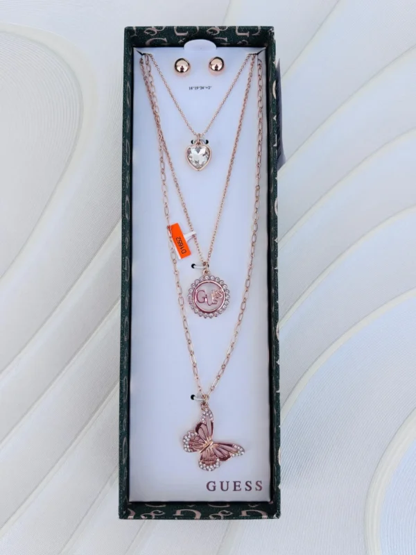 Collar Guess con aretes, detalles dorados mariposa