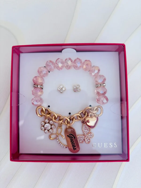 Pulsera Guess Elastica con cuentas rosadas